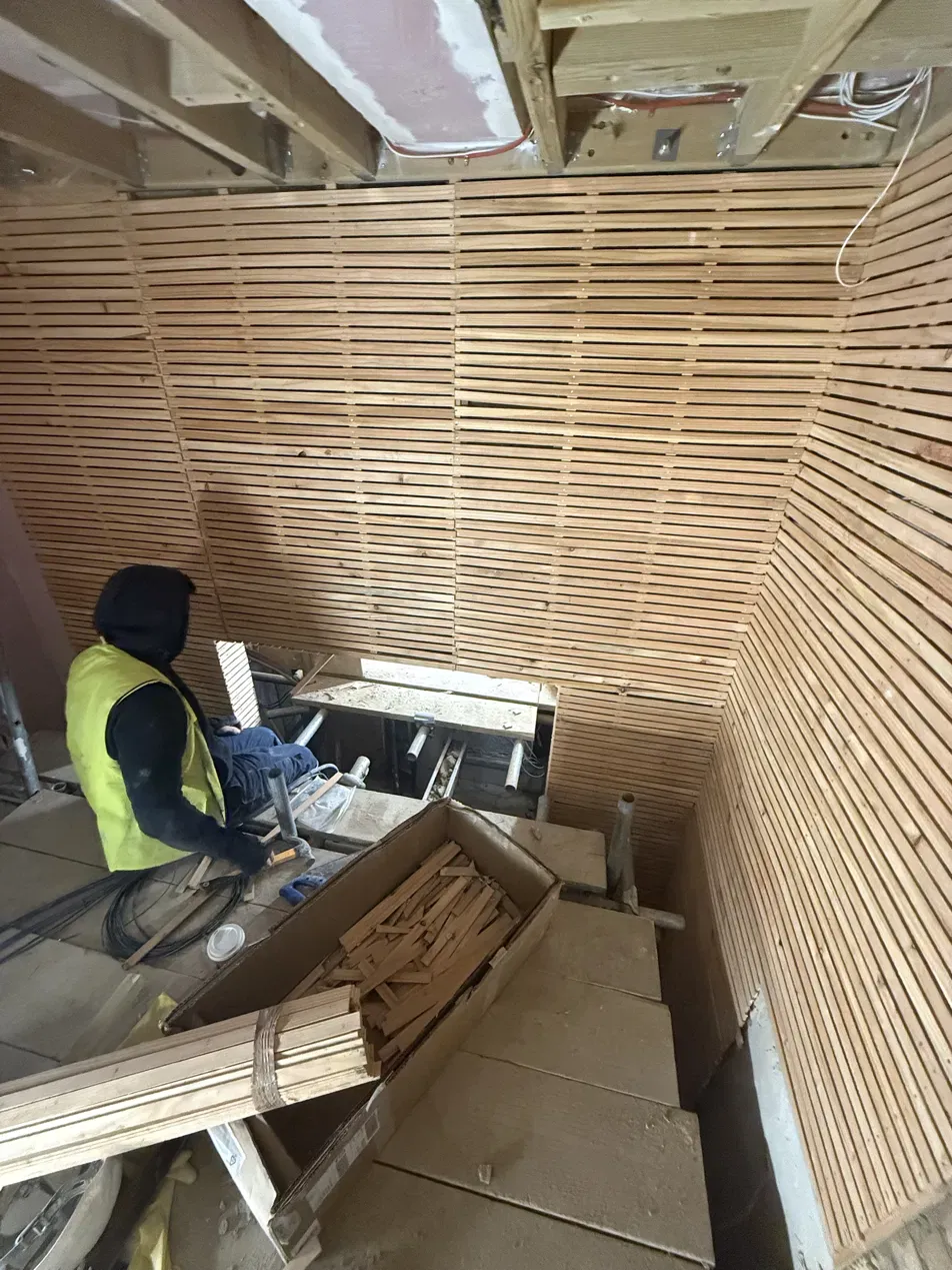 Riven timber lath prepared for lime plaster at Lancaster Gate in Bayswater, London