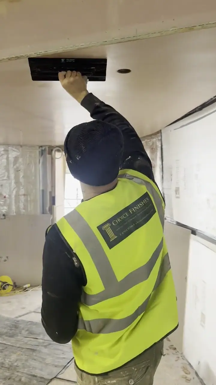 Choice Finishes plasterer skimming a ceiling, London